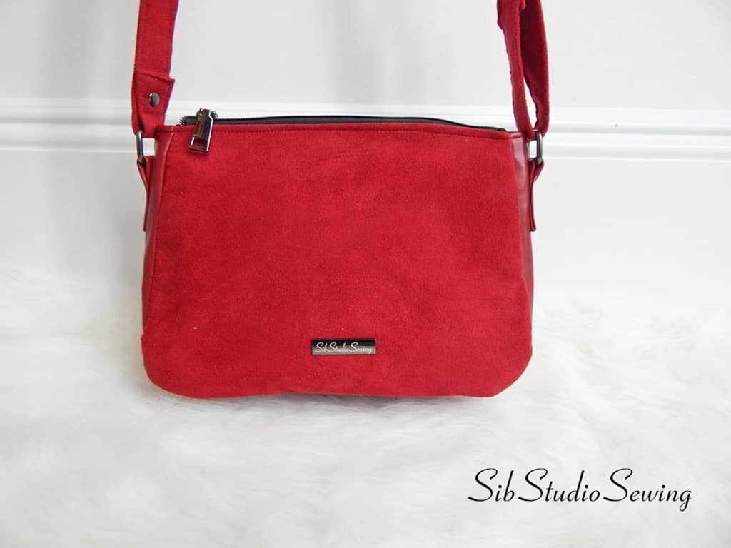 Red suede and faux leather crossbody bag